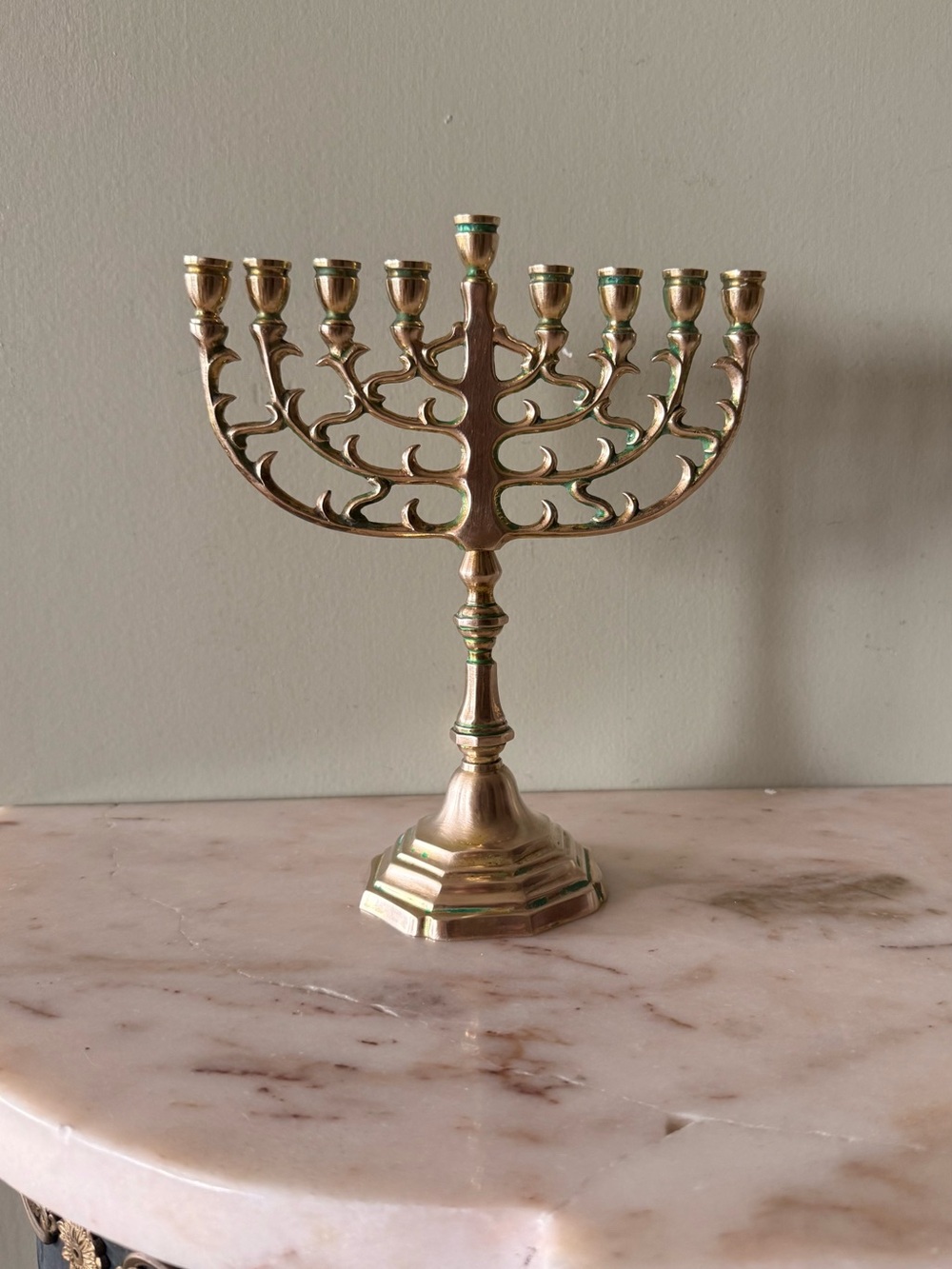 Small vintage brass menorah with patina